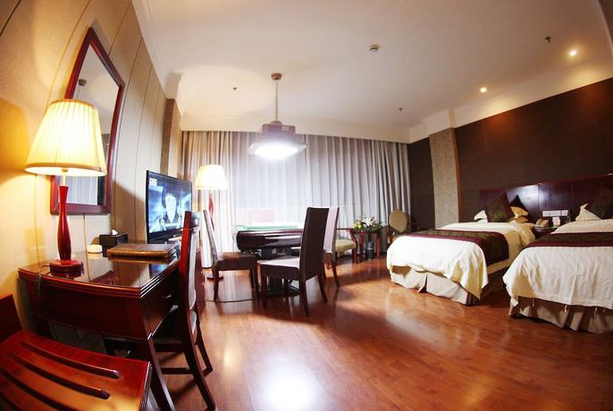 Imagen de la habitación del Hotel Peace International Hotel - Shangrao. Foto 10