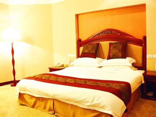 Imagen de la habitación del Hotel Peace International Hotel - Shangrao. Foto 12