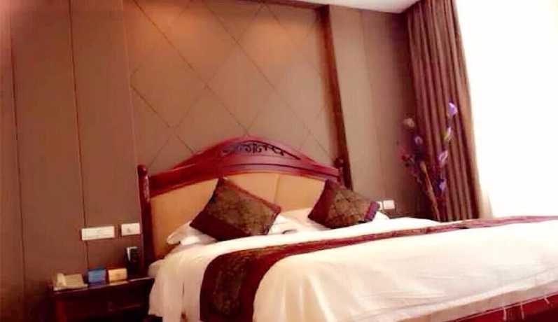 Imagen de la habitación del Hotel Peace International Hotel - Shangrao. Foto 14