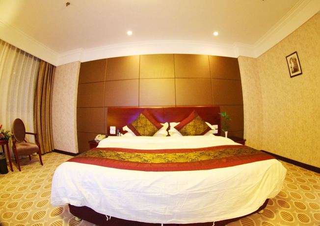 Imagen de la habitación del Hotel Peace International Hotel - Shangrao. Foto 16