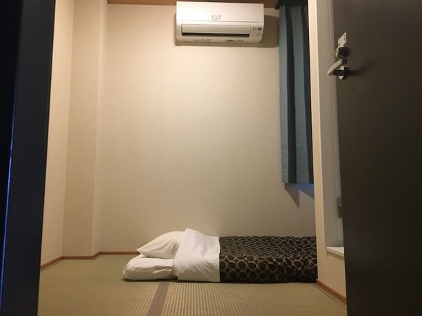 Imagen de la habitación del Hotel Peace International Ichinomiya. Foto 13