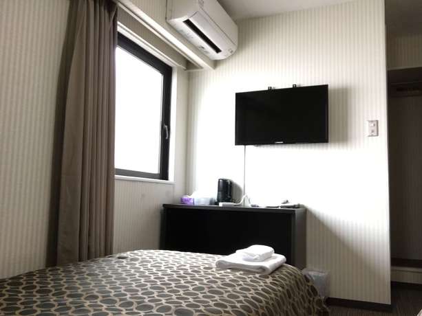 Imagen de la habitación del Hotel Peace International Ichinomiya. Foto 16