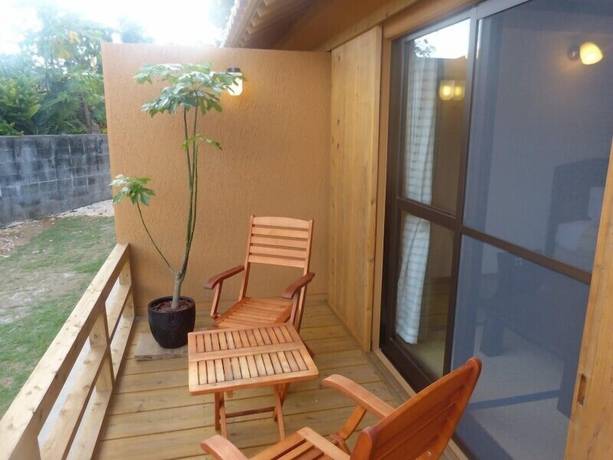 Imagen de la habitación del Hotel Peace Island Taketomijima. Foto 6