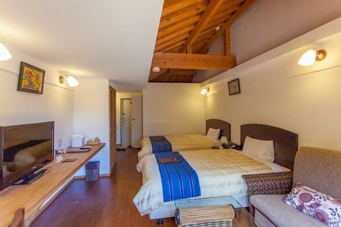 Imagen de la habitación del Hotel Peace Island Taketomijima. Foto 7