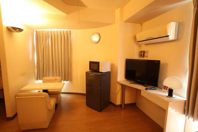 Imagen de la habitación del Hotel Peace Land Naha. Foto 2