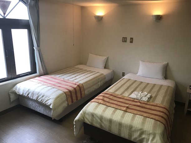 Imagen de la habitación del Hotel Peace Land Naha. Foto 6