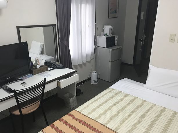 Imagen de la habitación del Hotel Peace Land Naha. Foto 11
