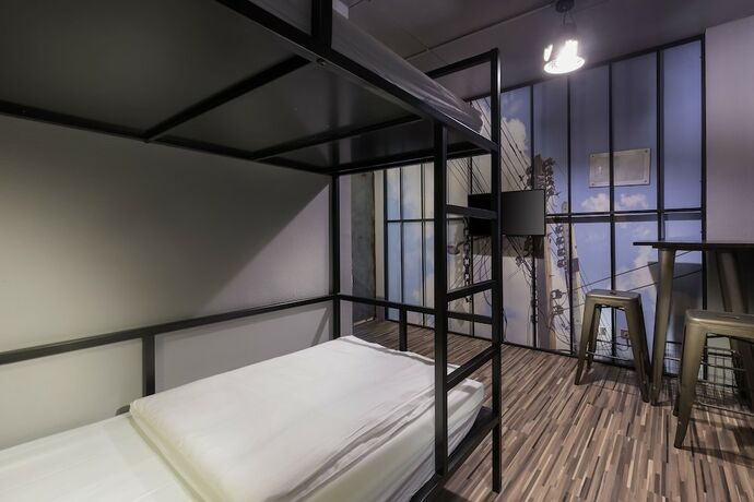 Imagen de la habitación del Hotel Peace Prison Cafe Inn. Foto 25