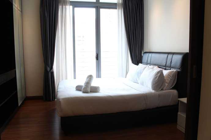 Imagen de la habitación del Hotel Peaceful Service Suites at Taragon Puteri Bintang. Foto 2