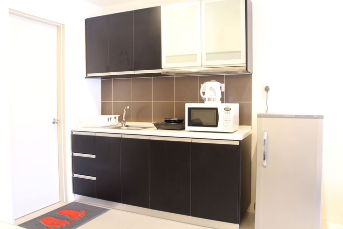 Imagen de la habitación del Hotel Peaceful Service Suites at Taragon Puteri Bintang. Foto 6
