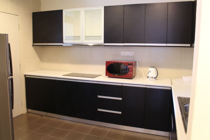 Imagen de la habitación del Hotel Peaceful Service Suites at Taragon Puteri Bintang. Foto 9