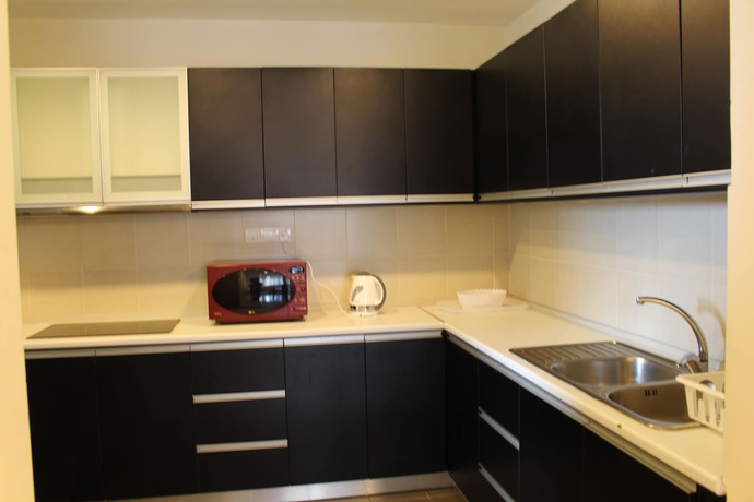 Imagen de la habitación del Hotel Peaceful Service Suites at Taragon Puteri Bintang. Foto 10
