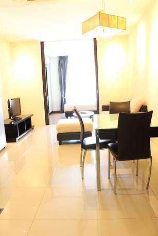 Imagen de la habitación del Hotel Peaceful Service Suites at Taragon Puteri Bintang. Foto 11