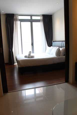 Imagen de la habitación del Hotel Peaceful Service Suites at Taragon Puteri Bintang. Foto 14