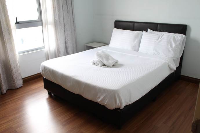 Imagen de la habitación del Hotel Peaceful Service Suites at Taragon Puteri Bintang. Foto 15