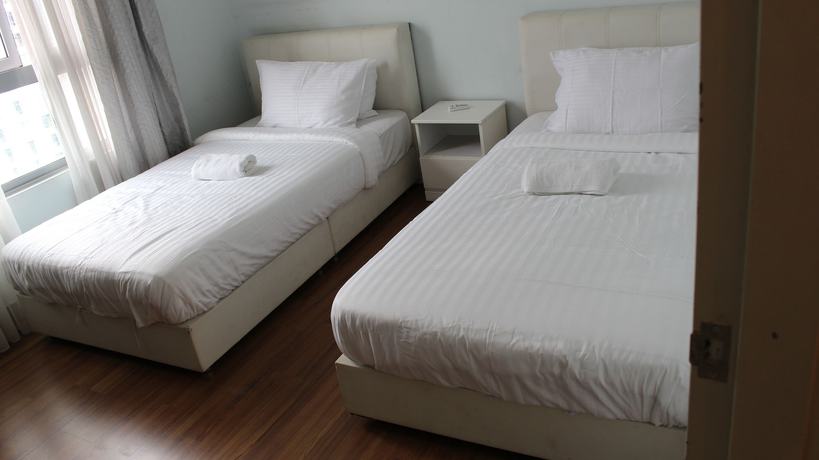 Imagen de la habitación del Hotel Peaceful Service Suites at Taragon Puteri Bintang. Foto 19