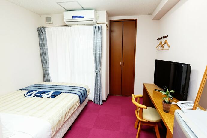 Imagen de la habitación del Hotel Peaceland Kume. Foto 15