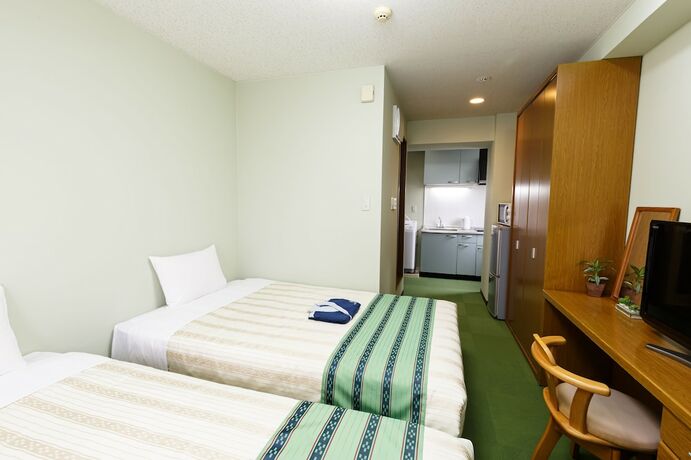 Imagen de la habitación del Hotel Peaceland Kume. Foto 17