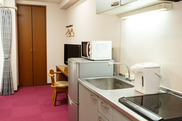 Imagen de la habitación del Hotel Peaceland Kume. Foto 18