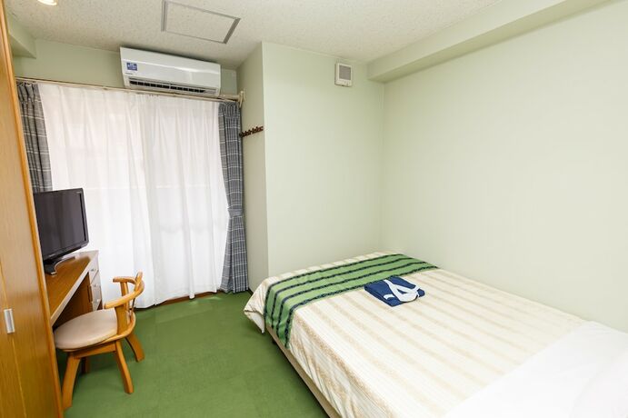 Imagen de la habitación del Hotel Peaceland Kume. Foto 20