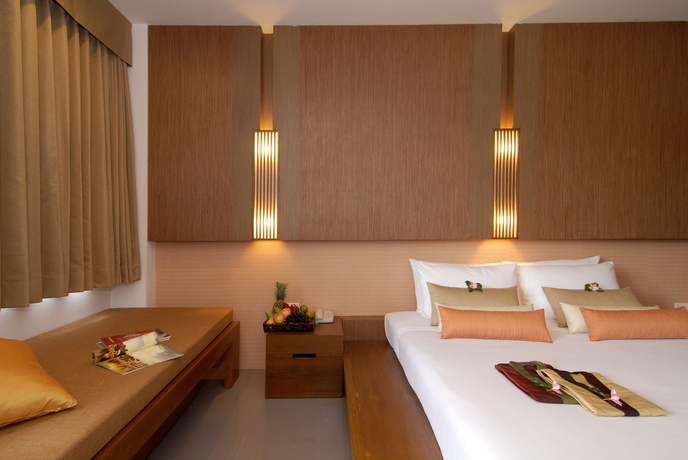 Imagen de la habitación del Hotel Peach Blossom Resort. Foto 4