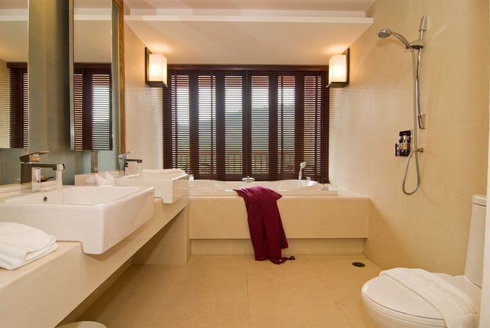 Imagen de la habitación del Hotel Peach Blossom Resort. Foto 7