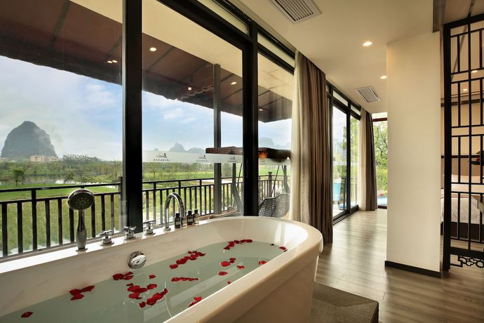 Imagen de la habitación del Hotel Peach Blossom Resort, GUILIN. Foto 2