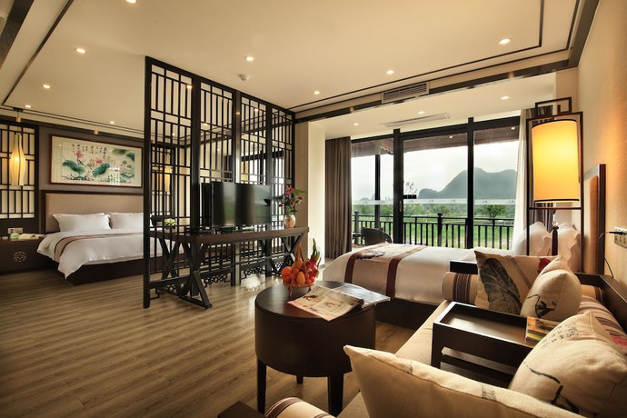 Imagen de la habitación del Hotel Peach Blossom Resort, GUILIN. Foto 5