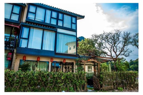 Imagen general del Hotel Peach Blossom River Resort. Foto 4