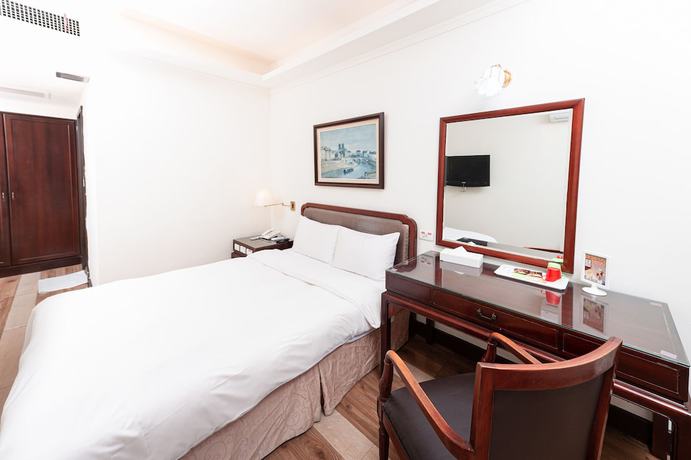 Imagen de la habitación del Hotel Peach. Foto 10