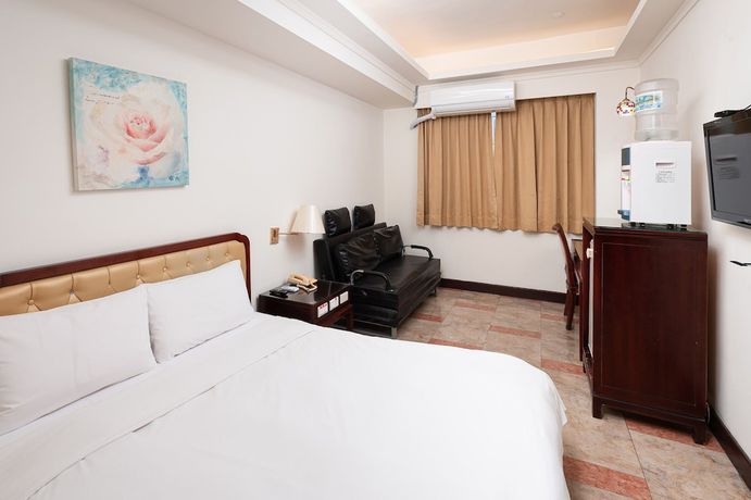 Imagen de la habitación del Hotel Peach. Foto 12