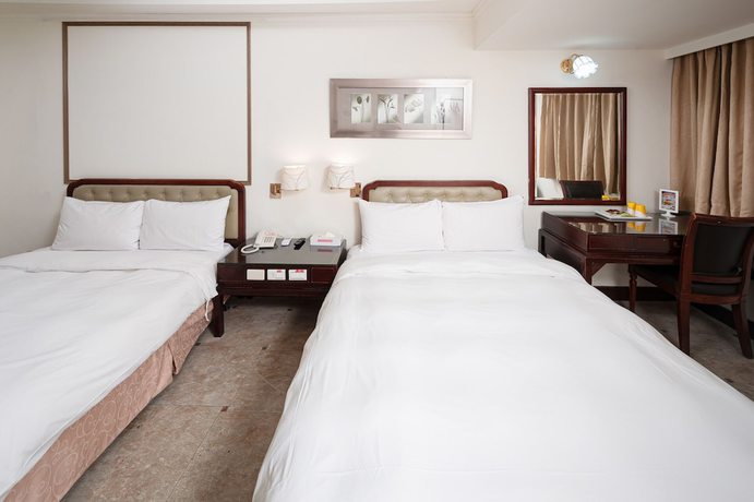 Imagen de la habitación del Hotel Peach. Foto 15