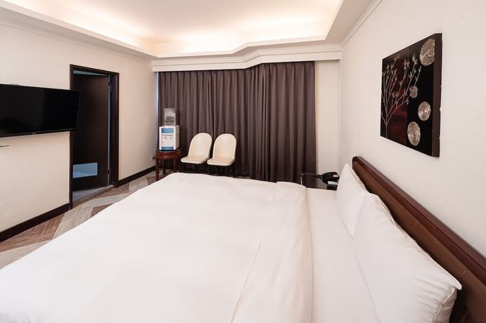Imagen de la habitación del Hotel Peach. Foto 17