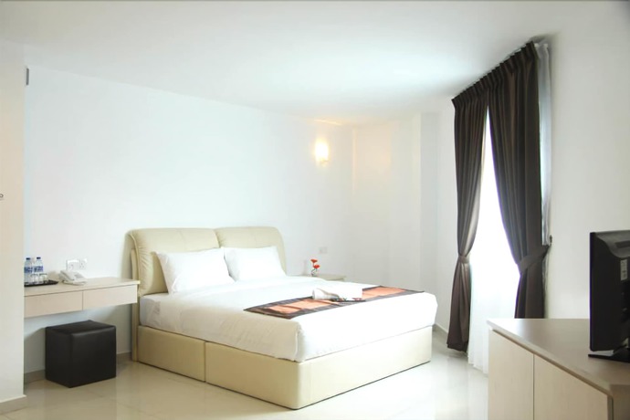 Imagen de la habitación del Hotel Peach Hill. Foto 5