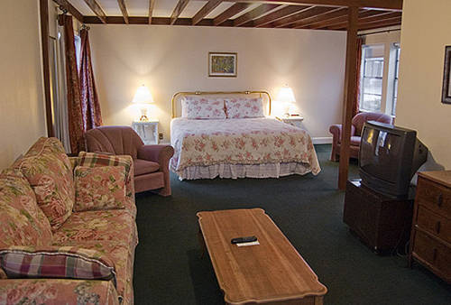 Imagen de la habitación del Hotel Peach Tree Inn and Suites. Foto 6