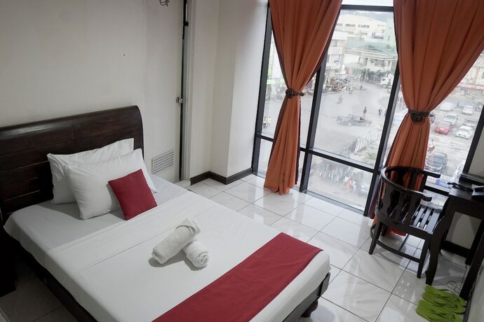 Imagen de la habitación del Hotel Peach Tree Lodge. Foto 16