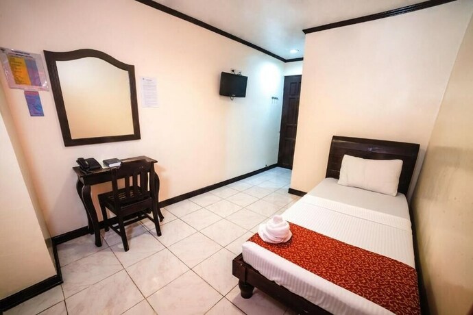 Imagen de la habitación del Hotel Peach Tree Lodge. Foto 21