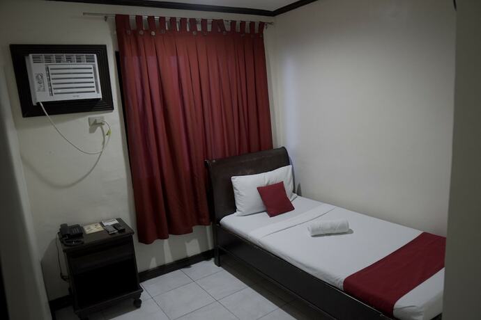 Imagen de la habitación del Hotel Peach Tree Lodge. Foto 23