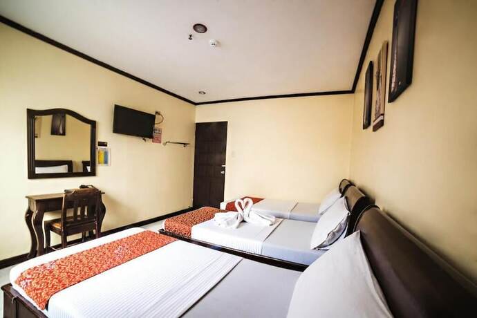 Imagen de la habitación del Hotel Peach Tree Lodge. Foto 24