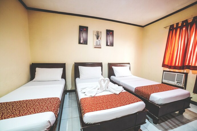 Imagen de la habitación del Hotel Peach Tree Lodge. Foto 25