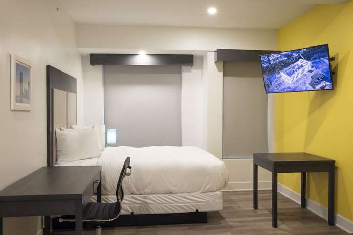 Imagen de la habitación del Hotel Peachtree Suites. Foto 13
