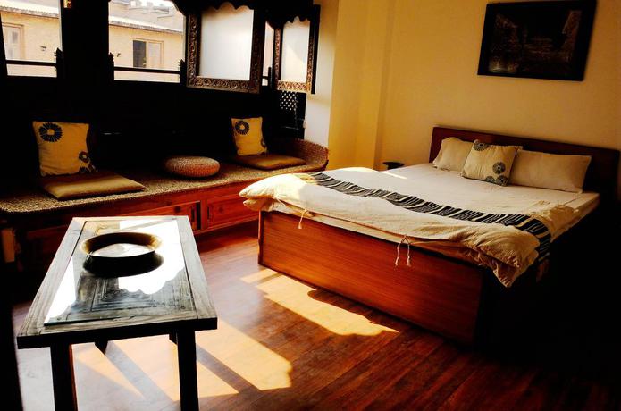 Imagen de la habitación del Hotel Peacock Guest House. Foto 7