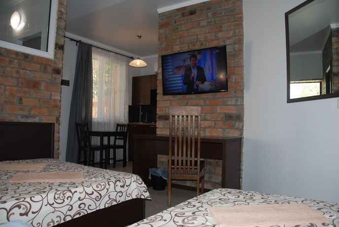 Imagen de la habitación del Hotel Peak Season. Foto 6