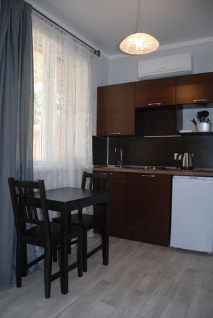 Imagen de la habitación del Hotel Peak Season. Foto 7
