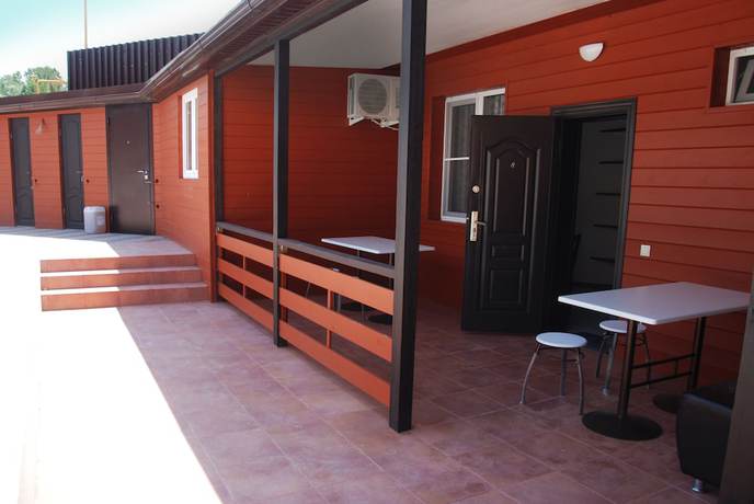 Imagen del bar/restaurante del Hotel Peak Season. Foto 3