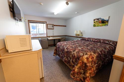 Imagen de la habitación del Hotel Peaks Lodge. Foto 10