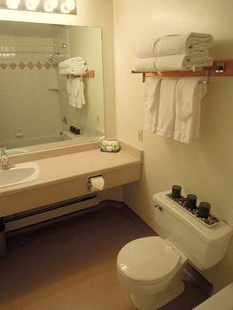 Imagen de la habitación del Hotel Peaks and Suites. Foto 4