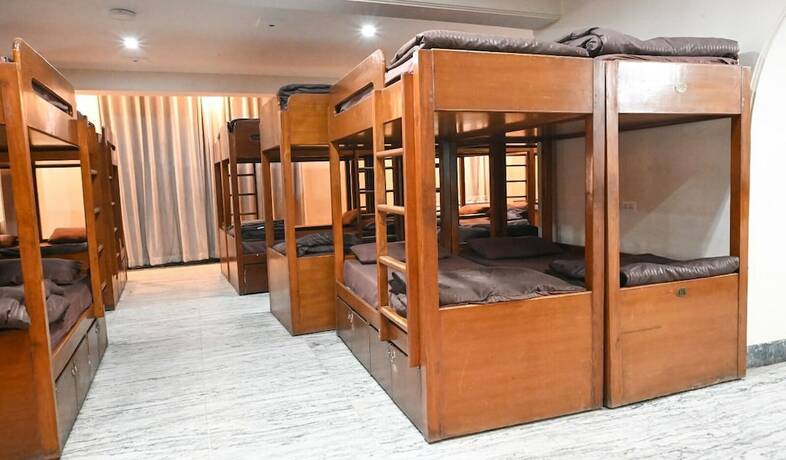 Imagen de la habitación del Hotel Pearl Courtyard Dormitory. Foto 8