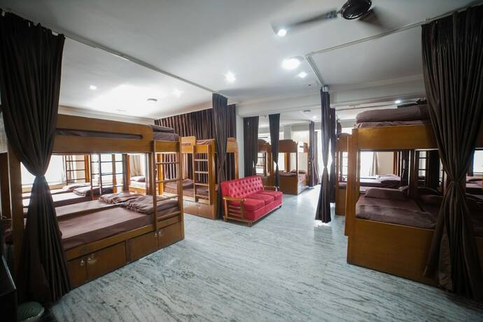 Imagen de la habitación del Hotel Pearl Courtyard Dormitory. Foto 10