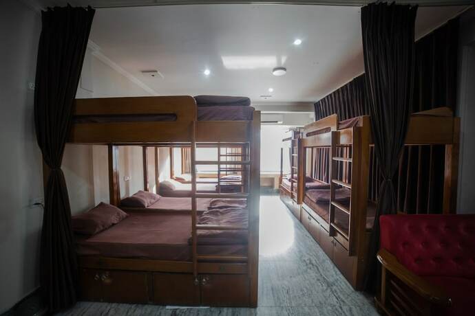 Imagen de la habitación del Hotel Pearl Courtyard Dormitory. Foto 11